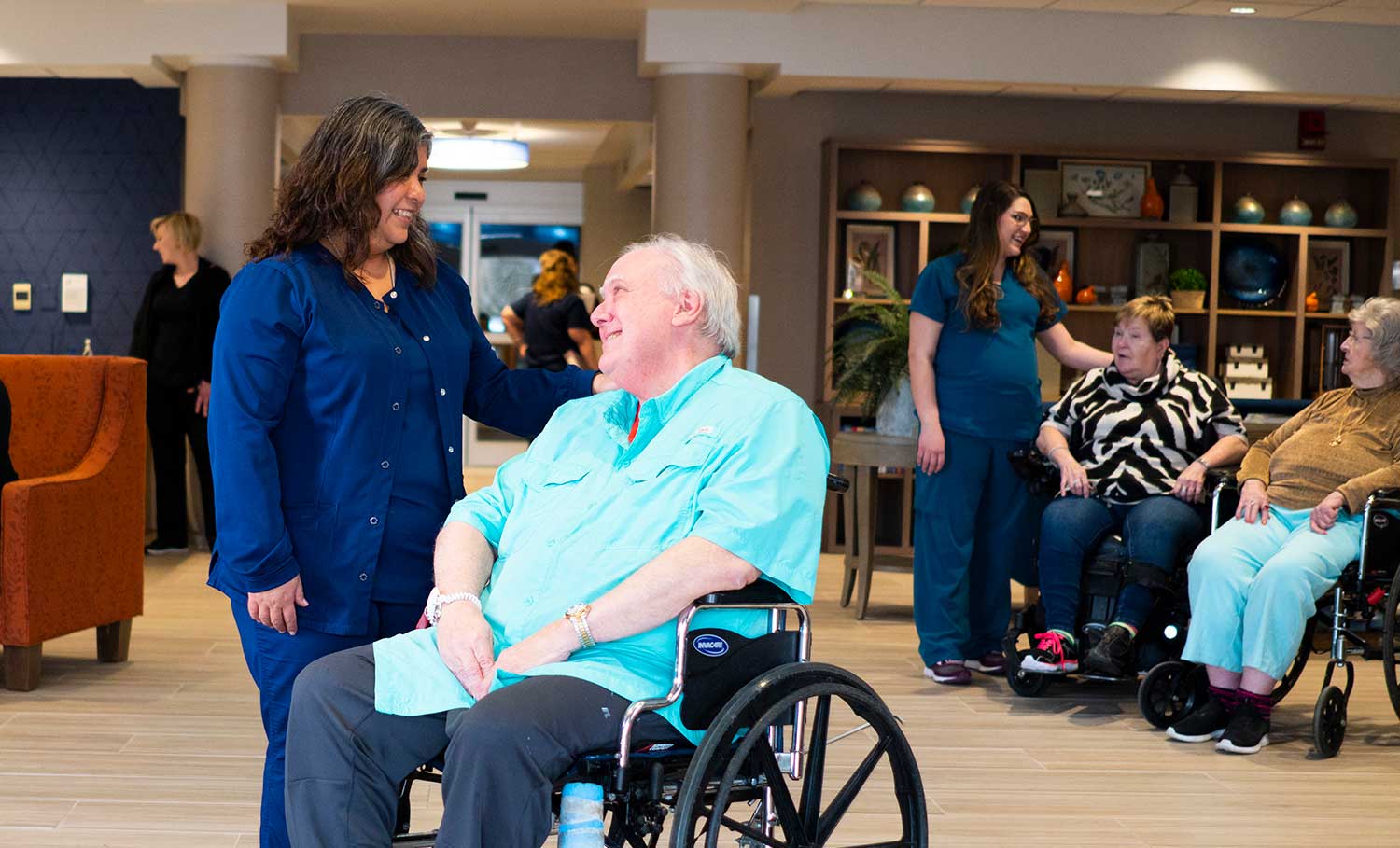 Lobby with residents and caregivers